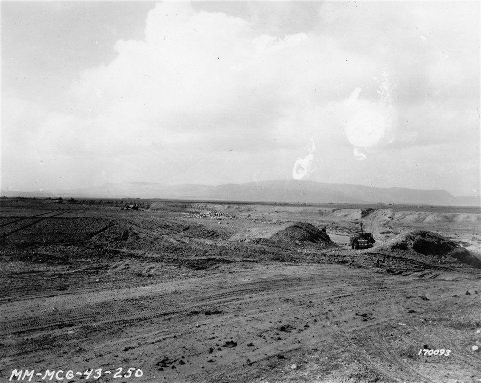 SC 170093 - Tanks lined up in a dry river, to set up as front line of defense. Kasserine Pass, Tunisia. 22 February, 1943.