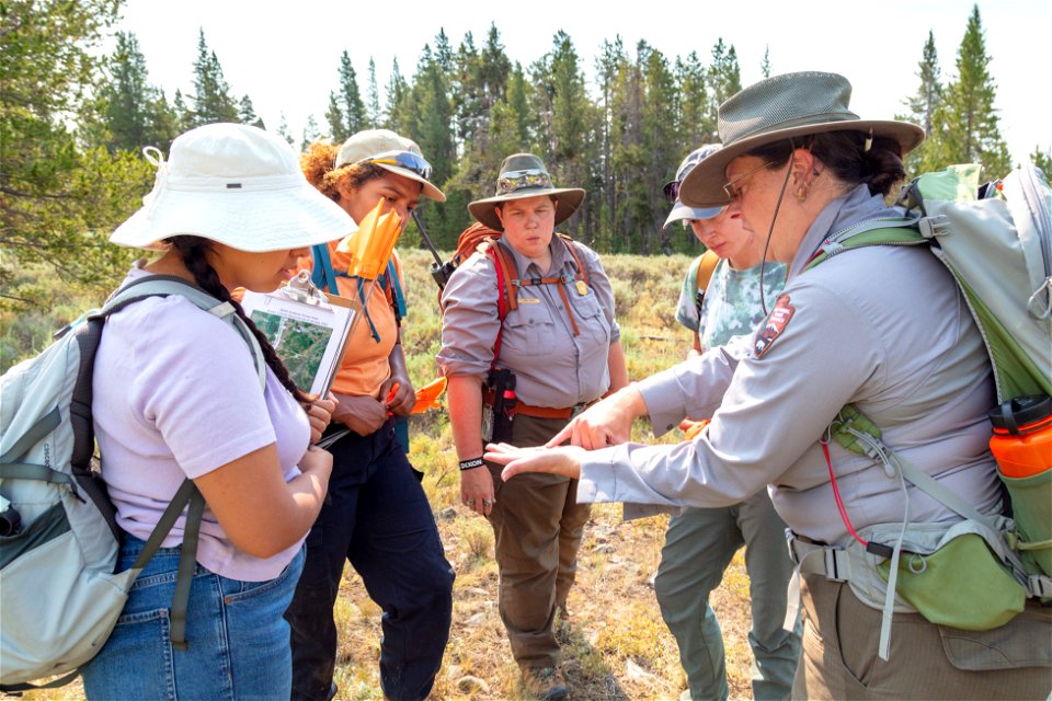 Salish Kootenai College Archaeology group: Beth Horton, park archaeologist explains inclusions in obsidian