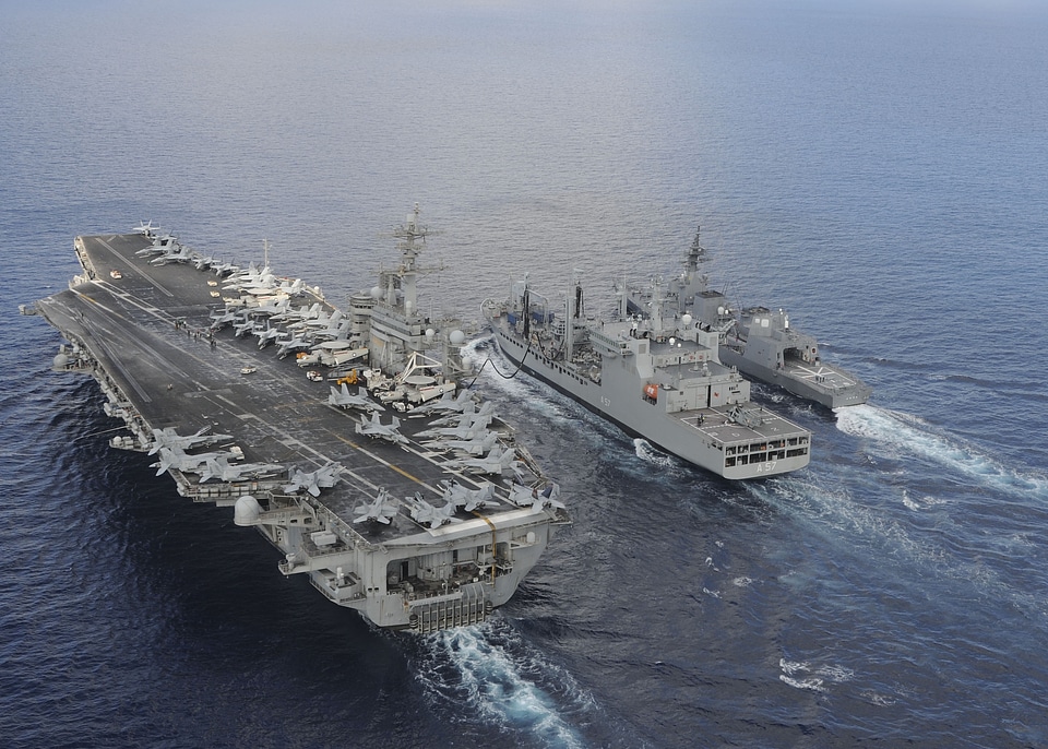 USS Theodore Roosevelt and JS Fuyuzuki sail alongside