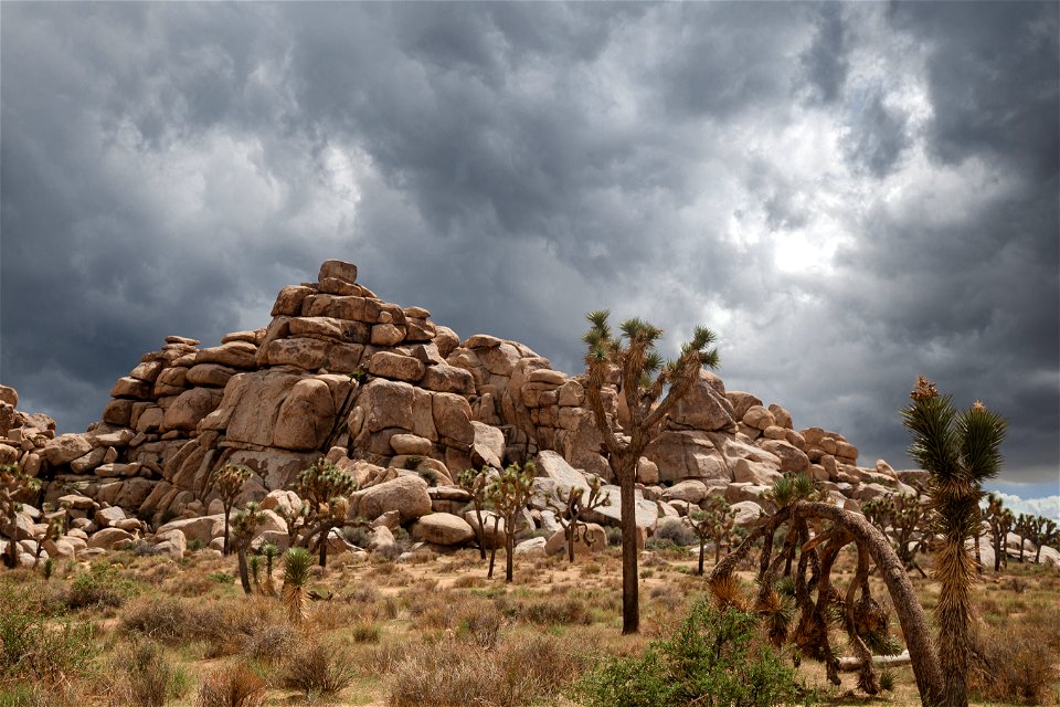 Boulder field near Cap Rock under storm clouds photo