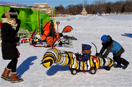 Family enjoying monarchs on the ice photo