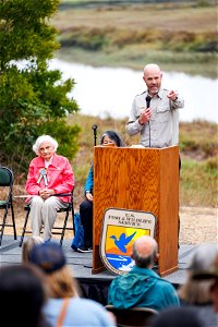 Complex manager speaks during opening ceremony photo