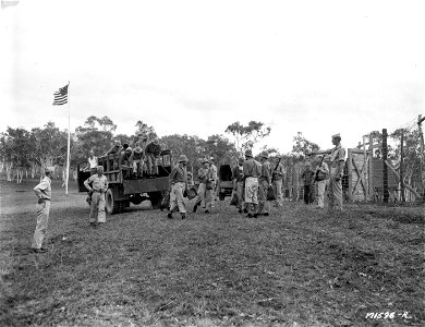 SC 171596-R - First Island Command, New Caledonia. Jap prisoners arrive at their new prison camp which has just been completed.