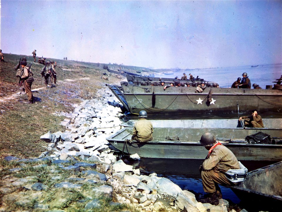 C-908 - Men prepare to board LCTs [sic] at Orsoy, Germany, as the 1st Bn., 314th Inf., 79th Div., crosses the Rhine River. photo