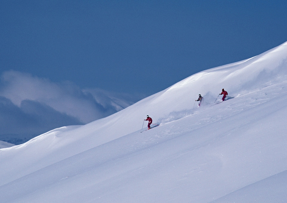 skier skiing on fresh powder snow