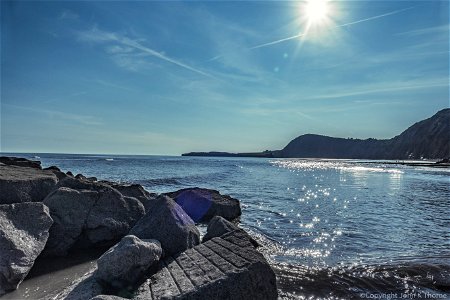 Sunshine sparkles on the sea. Sidmouth