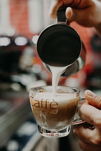 Close-up view of bartender preparing coffee