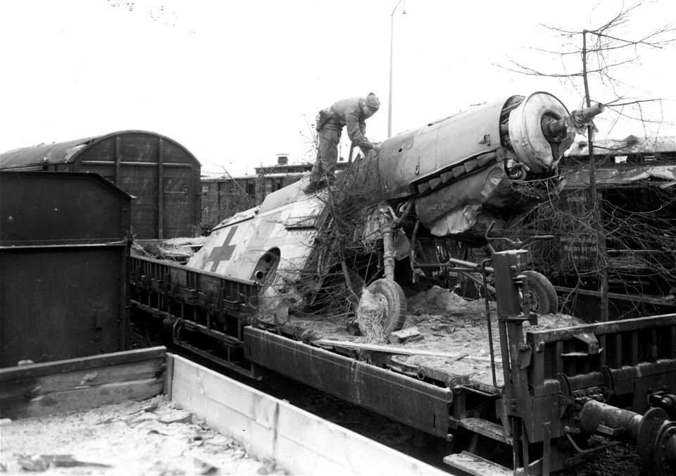 SC 196210 - Record coverage of railyards in Nurnberg, Germany. Much vital equipment was held up or destroyed in the railyards. Here's a plane that will never harass our troops.