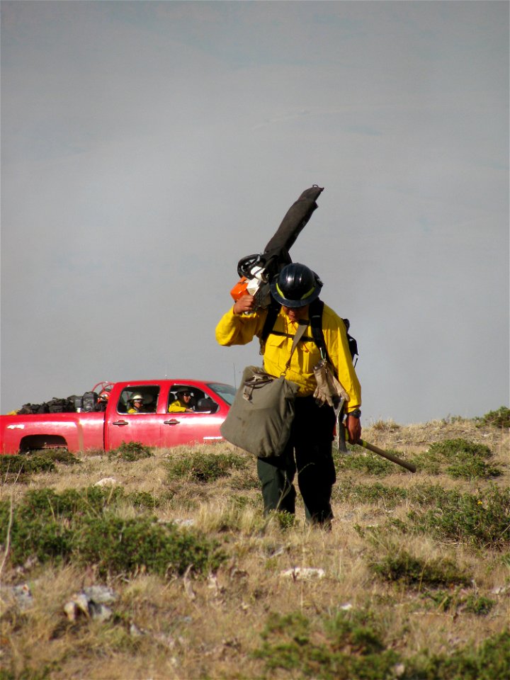 Firefighter with chainsaw