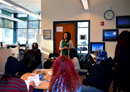 Equal Employment Specialist, Mandy Wise, talks with students at Gordon Parks High School in St. Paul about the Service and employment opportunities. photo