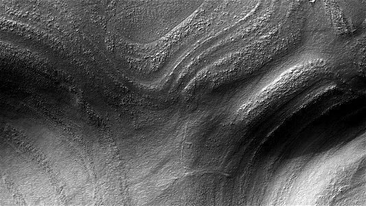 Deformed Layered Sediments in Western Hellas Planitia photo