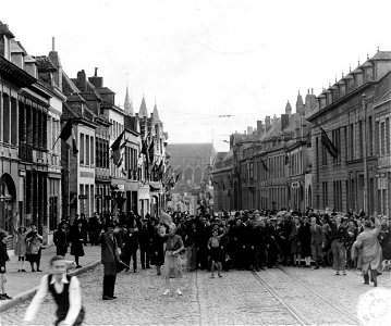 SC 329938 - Residents of Couvin, Belgium, flock into the streets to welcome the vanguard of American troops which arrived after driving out the Nazis. 3 September, 1944. photo