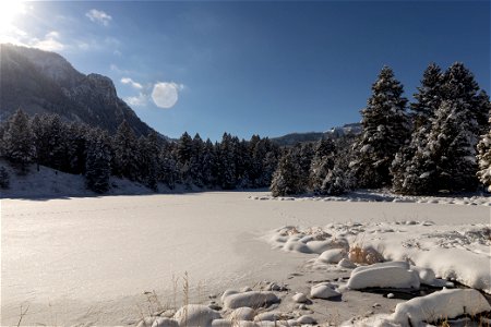 View of Bunsen Peak from a frozen lake (3) photo