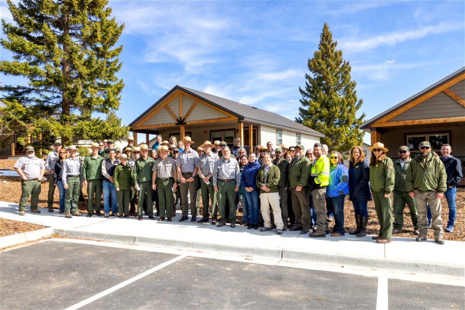 Housing improvement project goal 1 ribbon-cutting: employees in attendance