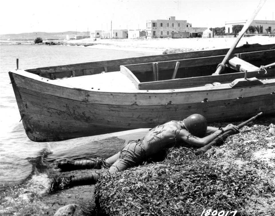 SC 180017 - Dead Italian, Tabeul Cape Bon. Water is filled with equipment. Tunisia. 10 May, 1943.