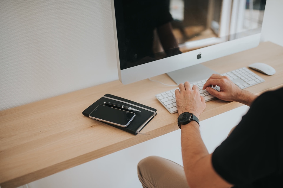 Man On Computer Typing photo