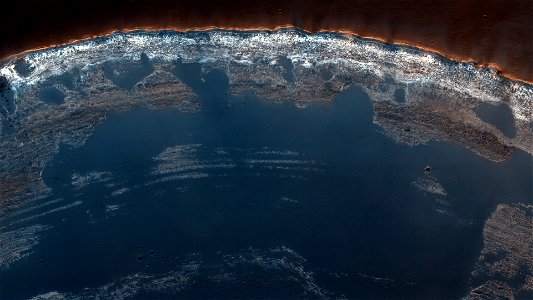 Light-Toned Sedimentary Rocks Exposed in a Syrtis Major Region Scarp