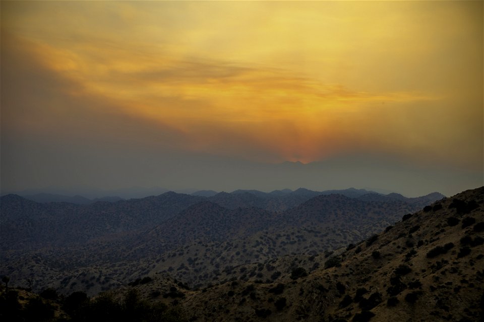 Smoke from Apple Fire at sunset at Eureka Peak