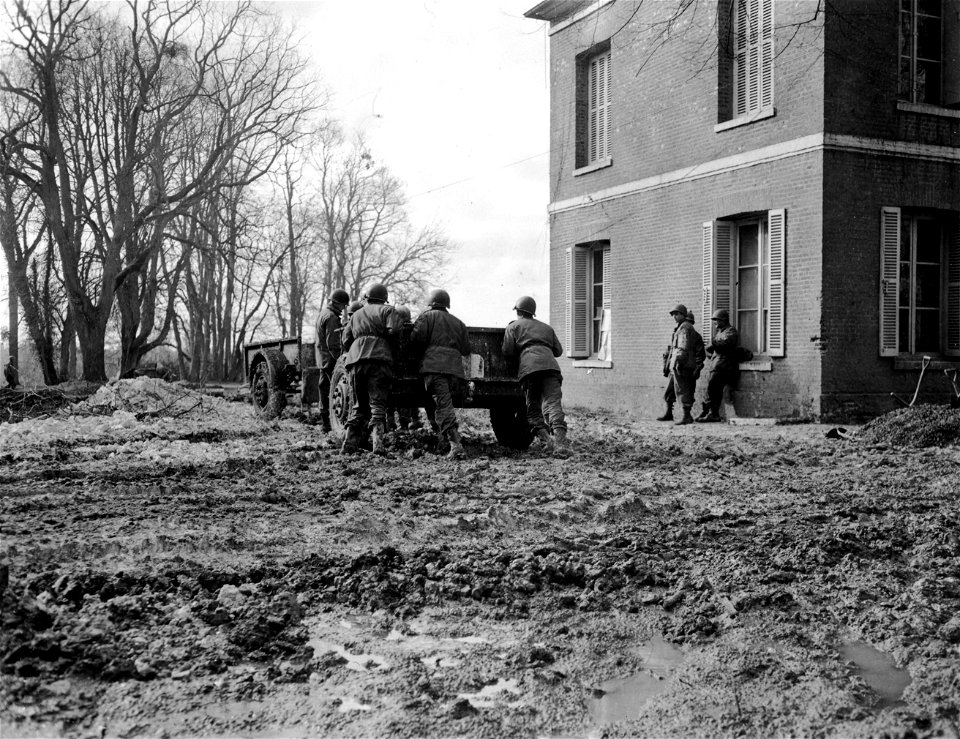 SC 221518 - Mud pix at 65th Armored Infantry. St. Andre. 24 February, 1945.