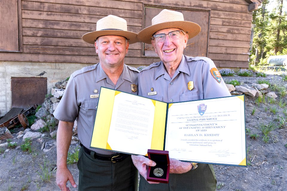 Cam Sholly presents Harlan Kredit the Superintendent's Outstanding Achievement Award for his 50th summer of service in Yellowstone
