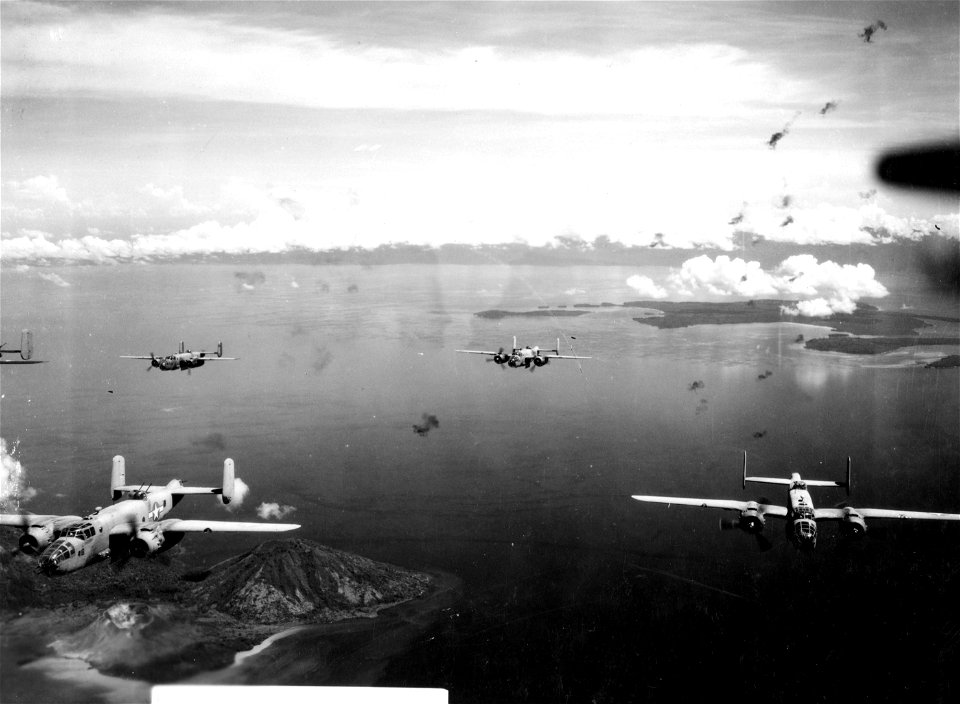 Aerial scene of PBJ planes in flight on mission over Rabaul. Marine Bombing Squadron 443.