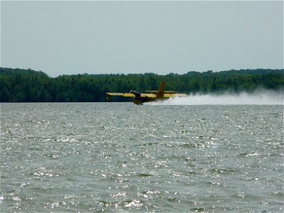 CL-215 Picking up water from Big Manistique Lake