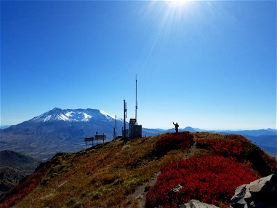 2017- GP-Staff member Orlando waves at Coldwater Mt St Helens while he is up there to maintain the radio repeater equipment.