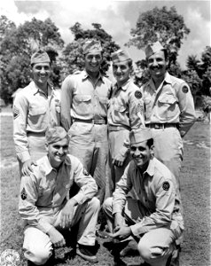 SC 335380 - Veterans of Saipan, this group of heroes, members of the 27th Div., are shown in their Company Area at Espiritu Santu, New Hebrides, where the Div. is currently stationed. photo