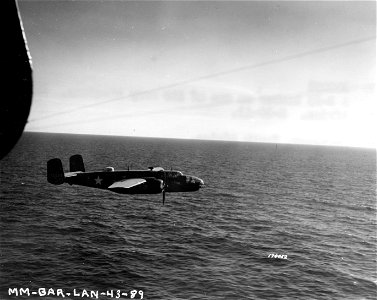 SC 170052 - A B-25 bomber on one of its many missions. Berteaux, North Africa. 10 February, 1943. photo