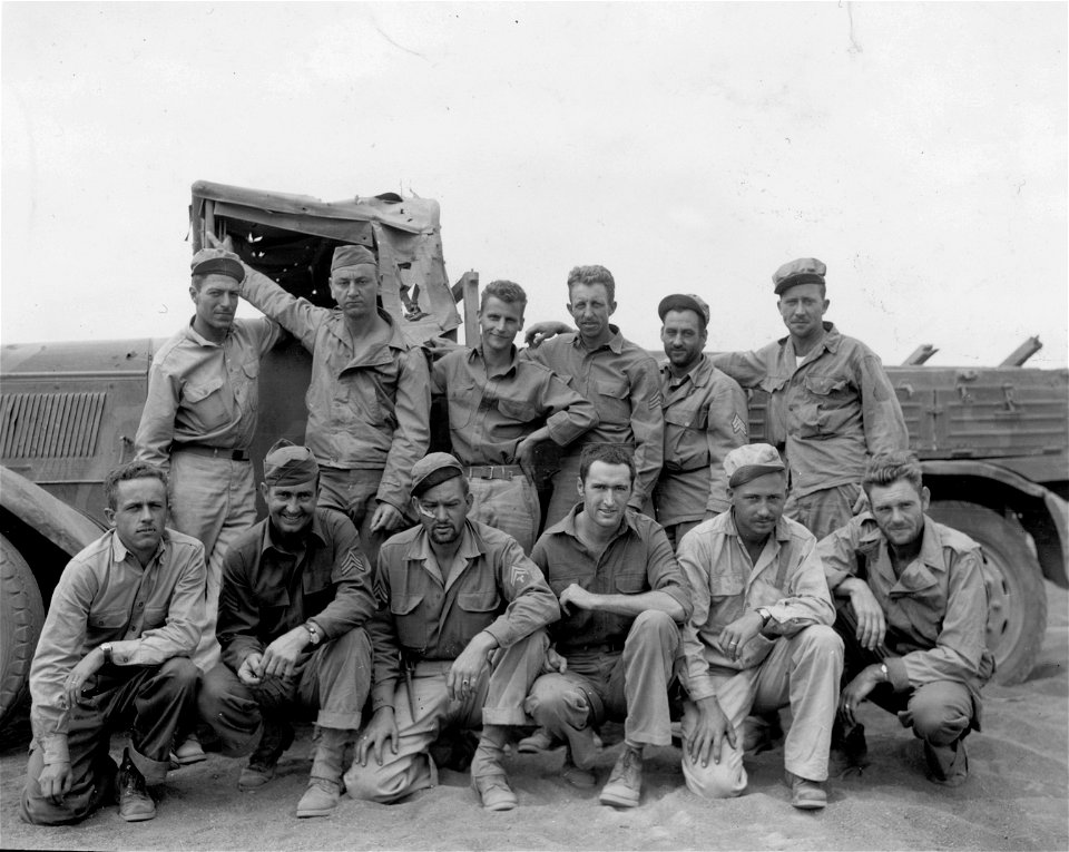 SC 335367 - Former residents of Walla Walla, Wash., take time out from their battle chores for a jaw session on the old town.