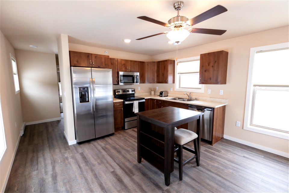 Kitchen layout inside new one-bedroom seasonal housing unit