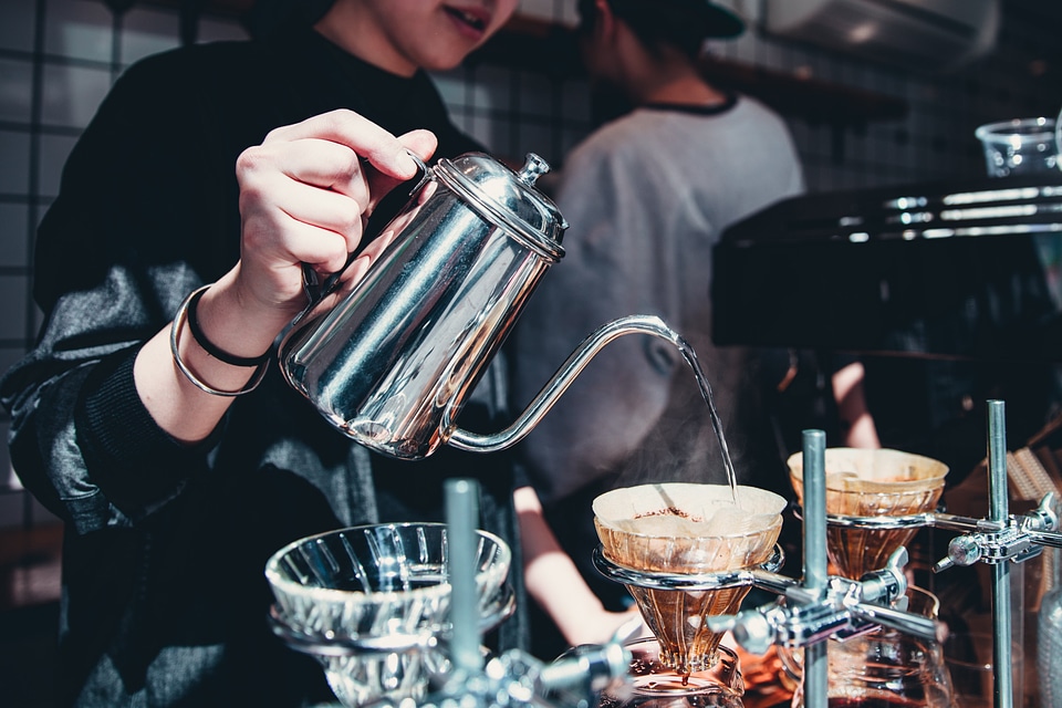 Barista Pouring Coffee photo