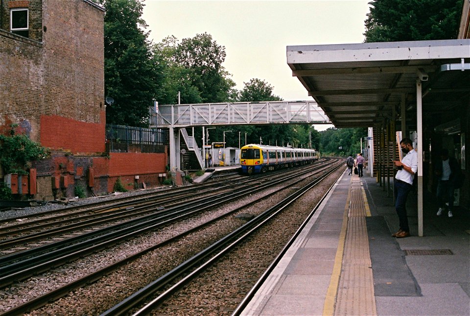 The London Overground serves Sydenham station with its staggered platforms.