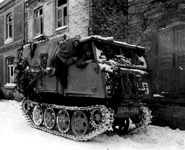 SC 198848 - A German tracked prime mover is brought in from the Belgian front by Lt. Col. Richard D. Sutton, Jacksonville Beach, Fla., CO, 3rd Battalion.