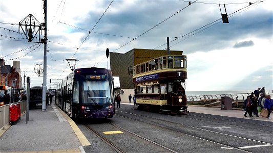 Oldest and newest trams operating in Blackpool photo