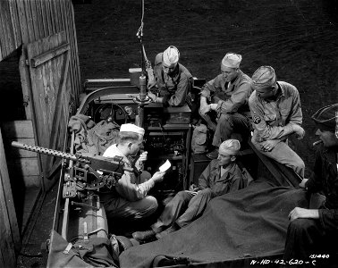 SC 151440 - Members of a Tank Batt. use radio set up in a half-track. photo