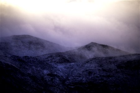 Mist and snow over Belle Mountain photo