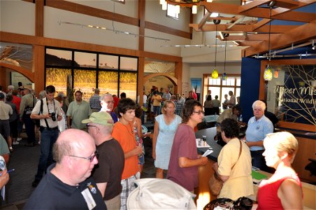 Crowd inside new visitor center photo