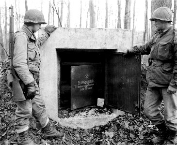 SC 330037 - Found by infantrymen in the Bien Woods, this is a German store place for explosives.
