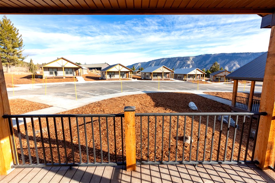 YACC Camp Housing Project: porch views of completed camp and parking area