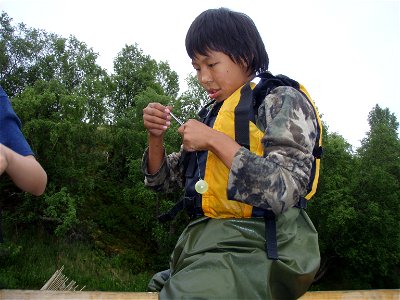 Anthony with salmon scale
