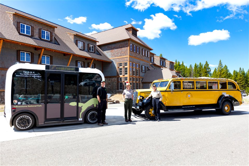 Transportation in Yellowstone, old and new: Beep and Xanterra Drivers with NPS employee