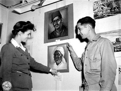 SC 374646 - First prize by popular vote in the Art Exhibit sponsored by the Red Cross and held in the American Red Cross Service Club in Noumea, New Caledonia, was this portrait in oil by Cpl. Charles C. Munne, U.S. Army. photo