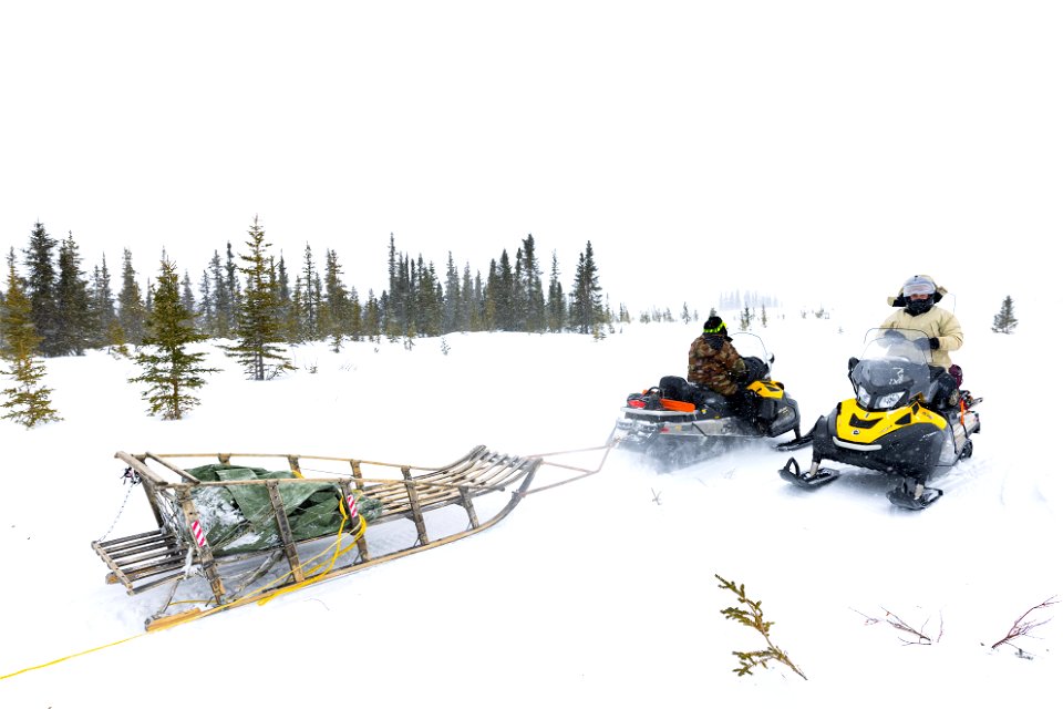 Snowmachines on the winter trail.