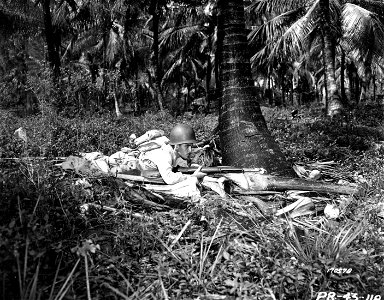 SC 170578 - This photo shows soldiers on the alert with full field equipment during maneuevers. 14 February, 1943.