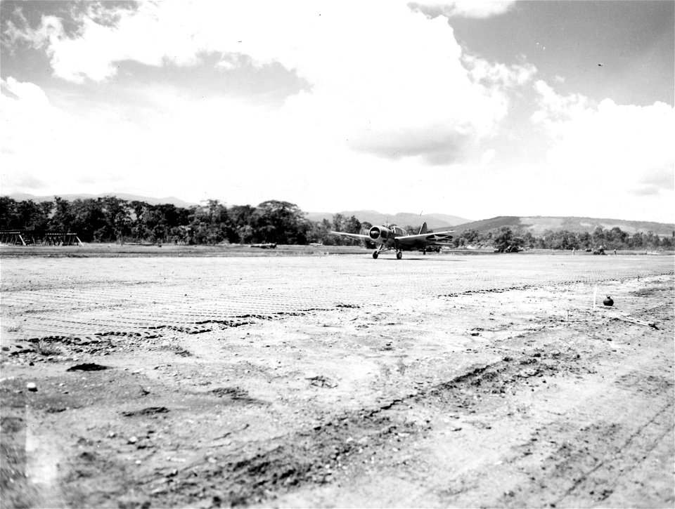 OS2W takes to the air from the airport on Guadalcanal. December, 1942.