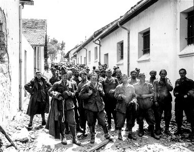 SC 171612 - Lineup of decrepit Italian prisoners taken by the 9th Division. Tunisia, North Africa. 1 May, 1943.