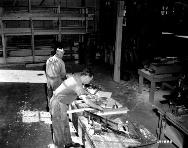 SC 184888 - These German war prisoners at Camp Wallace, Texas, found themselves "at home" in their assigned work having been carpenters in Germany, they were given jobs in the wood work shop at the camp. 1943.