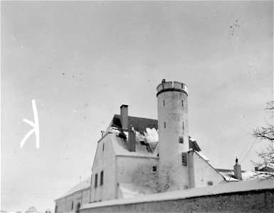 SC 329970 - Tower of large suburban home in Belgian town of Berzdorf is used by soldier of 4th Infantry Division for observation post. 5 January, 1945. photo