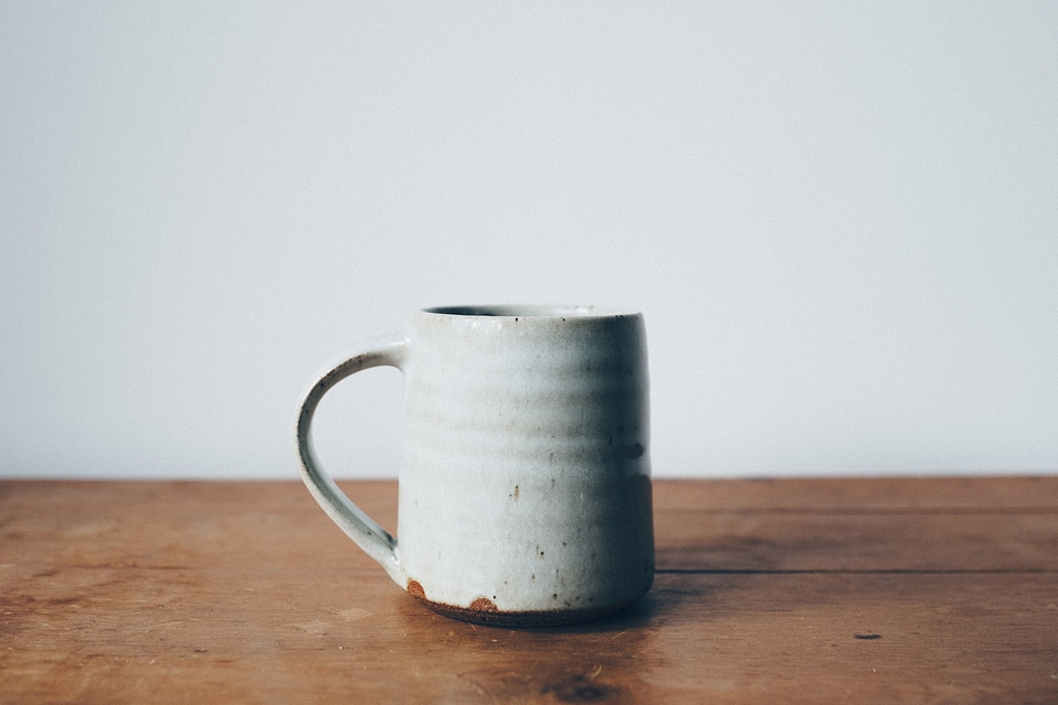 Rustic Coffee Mug on Wooden Table photo